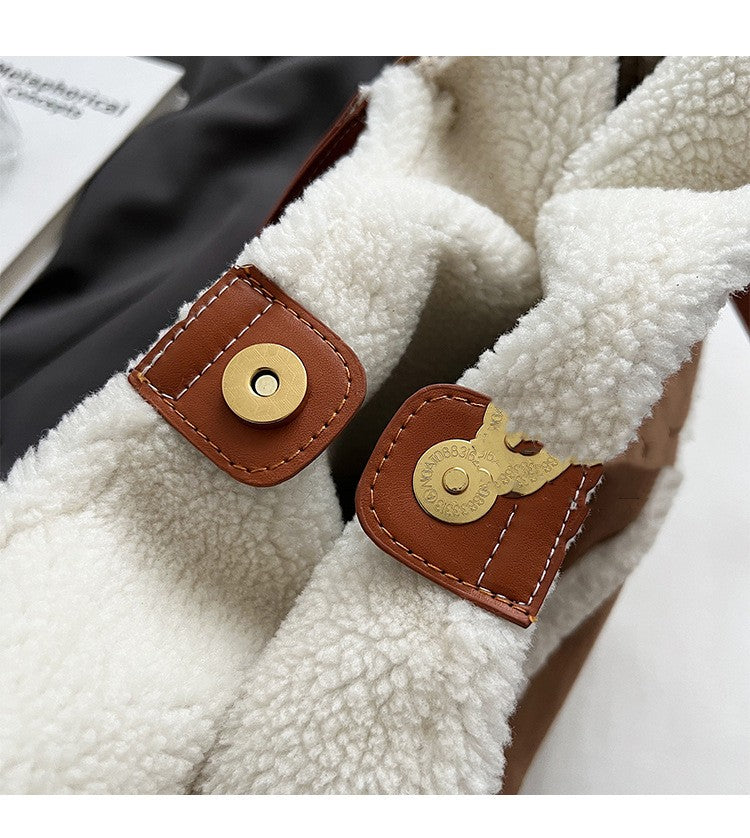 Interior pocket detail and lining of plush suede tote