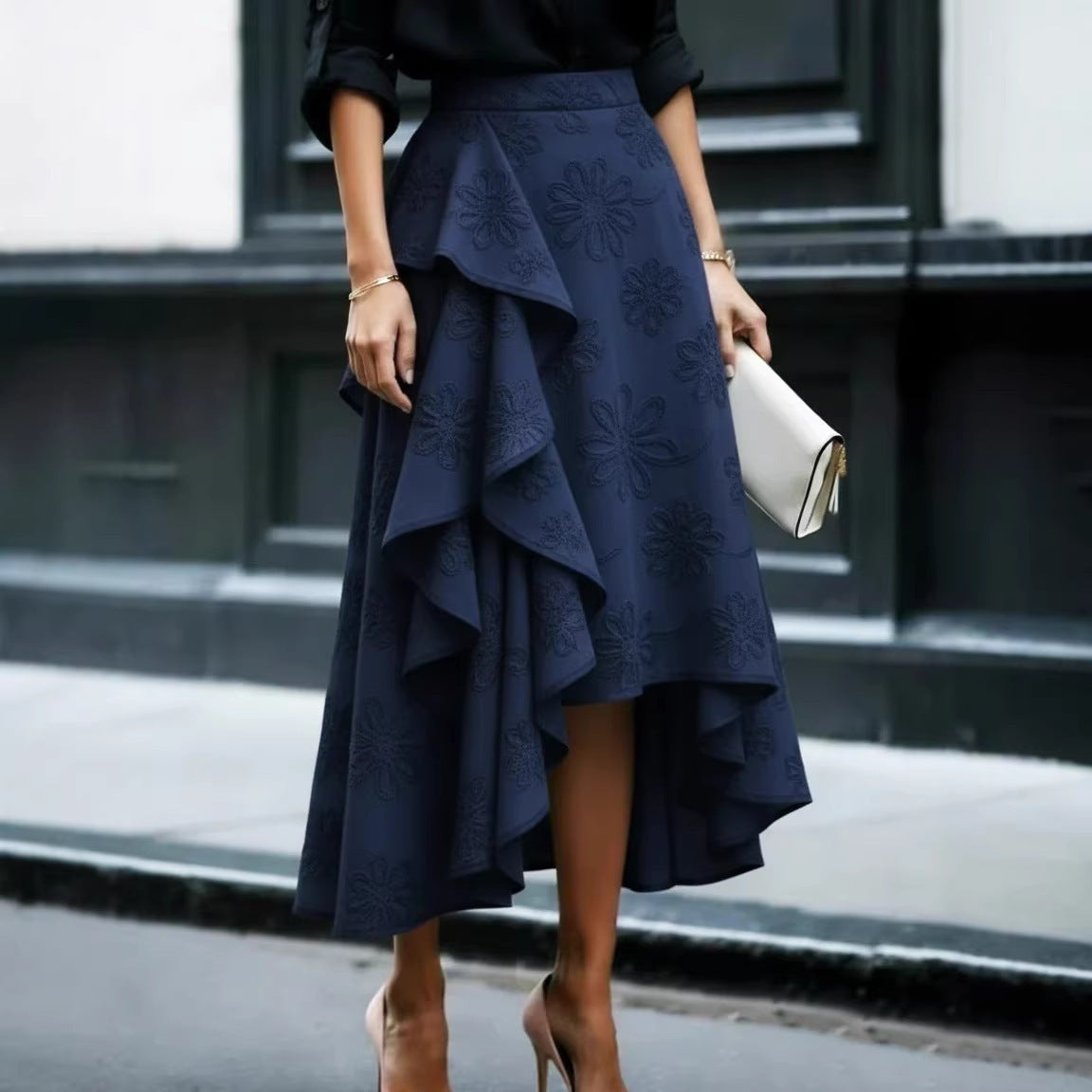 Back view of skirt showing elegant drape and wave-hem design