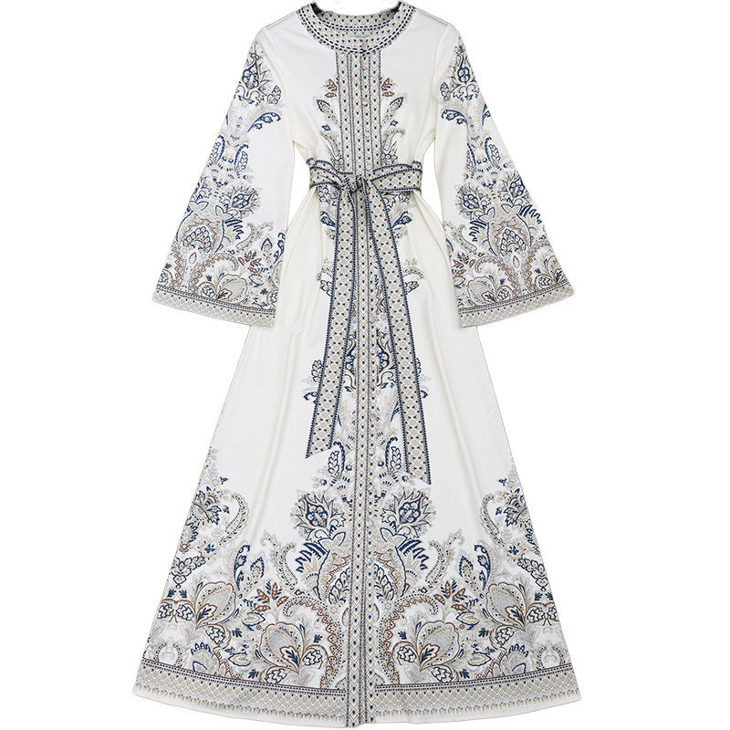 Close-up of intricate floral print and embroidery details on dress fabric