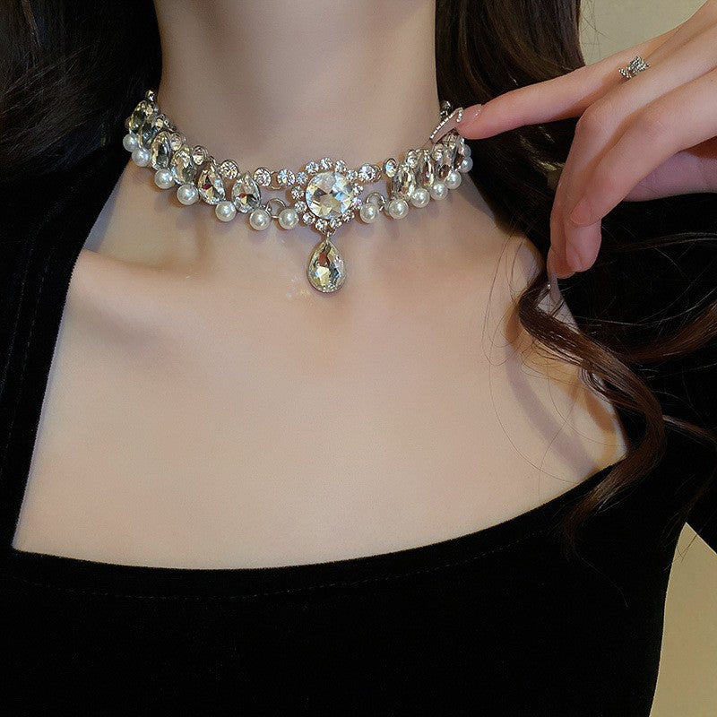 Necklace layered with complementary pieces for modern styling inspiration