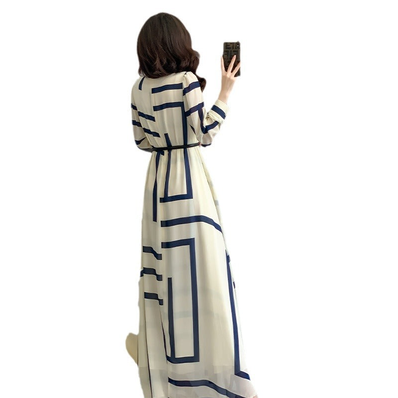 Back view showing elegant draping and full-length sleeve detail