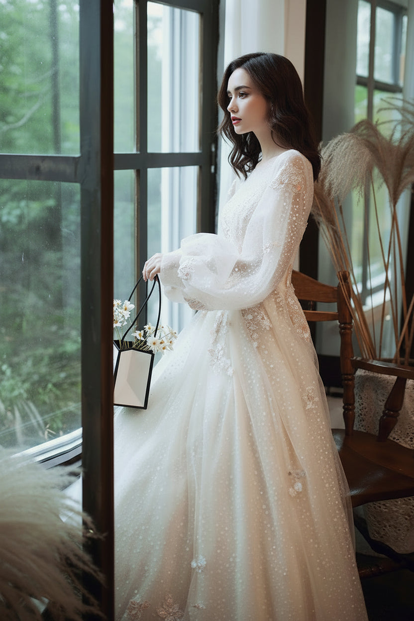 Burgundy modest evening bridal gown with long sleeves and flowing skirt