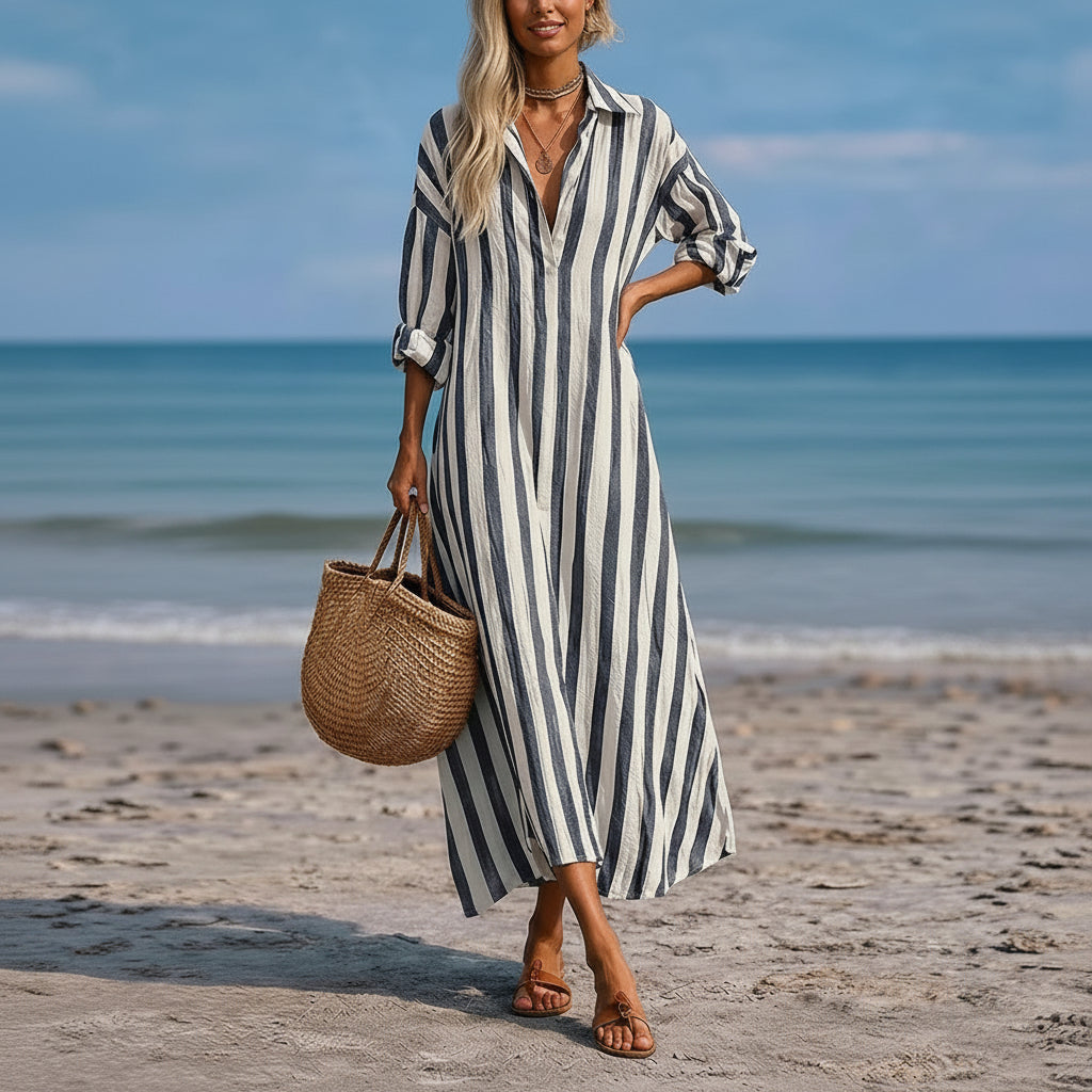 Blue and white striped summer dress with short sleeves and A-line silhouette