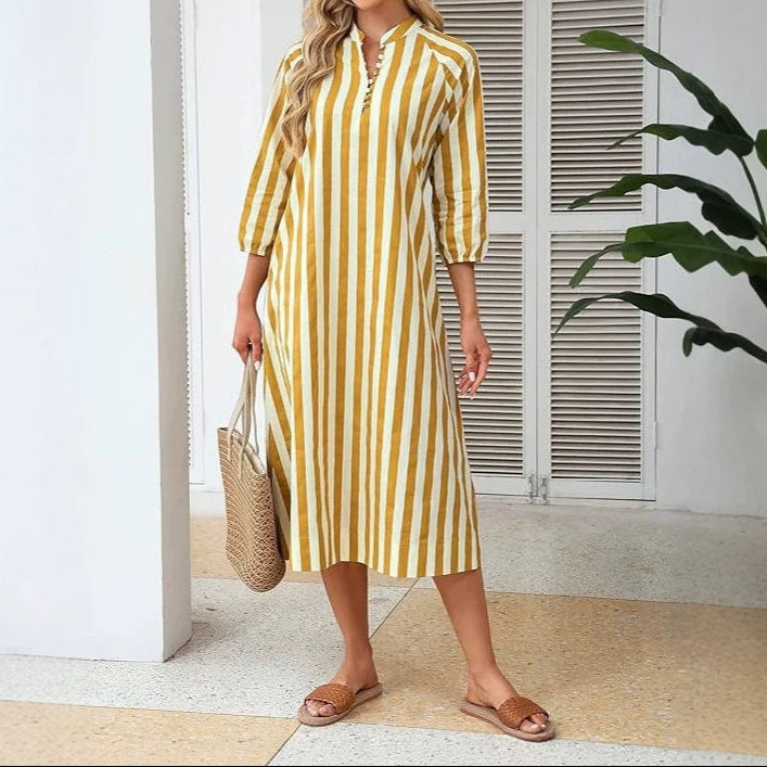 Side profile of dress displaying drape and silhouette