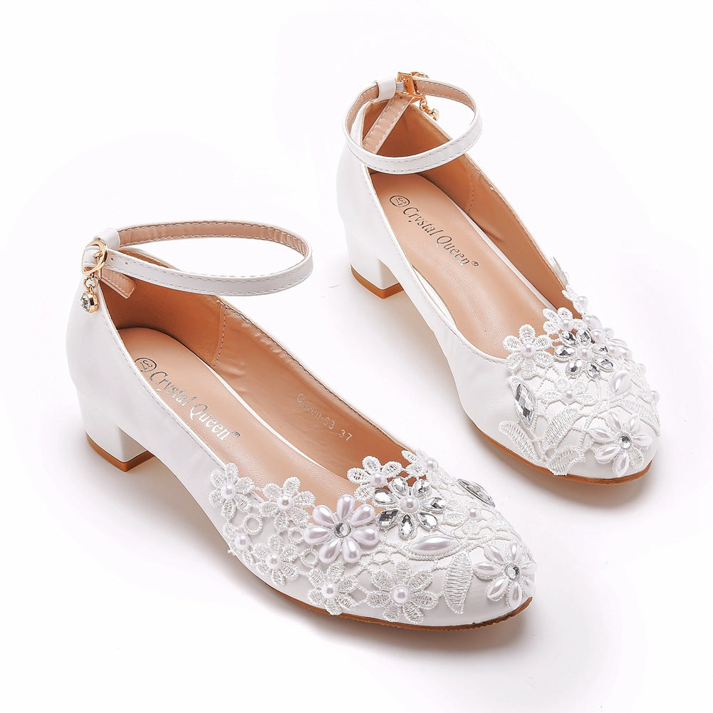 Back view of white lace heel showing heel height and design