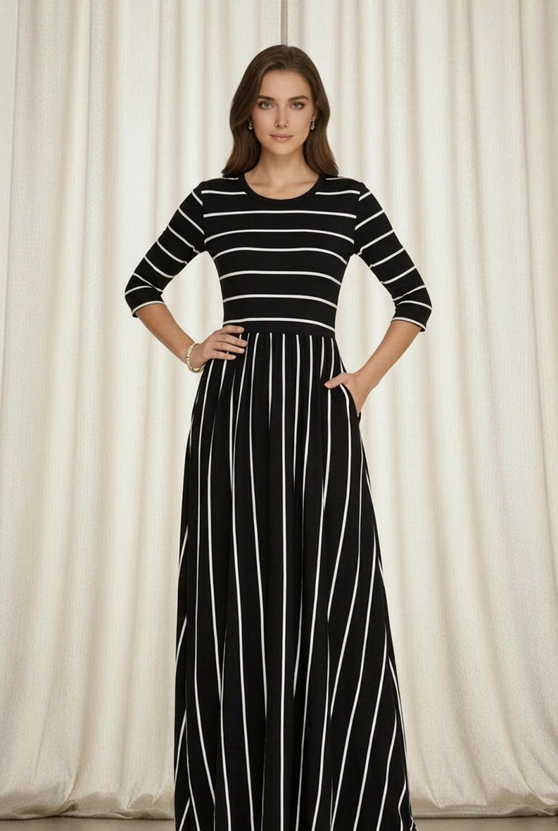 Navy and white striped round neck dress with three-quarter sleeves and high waist