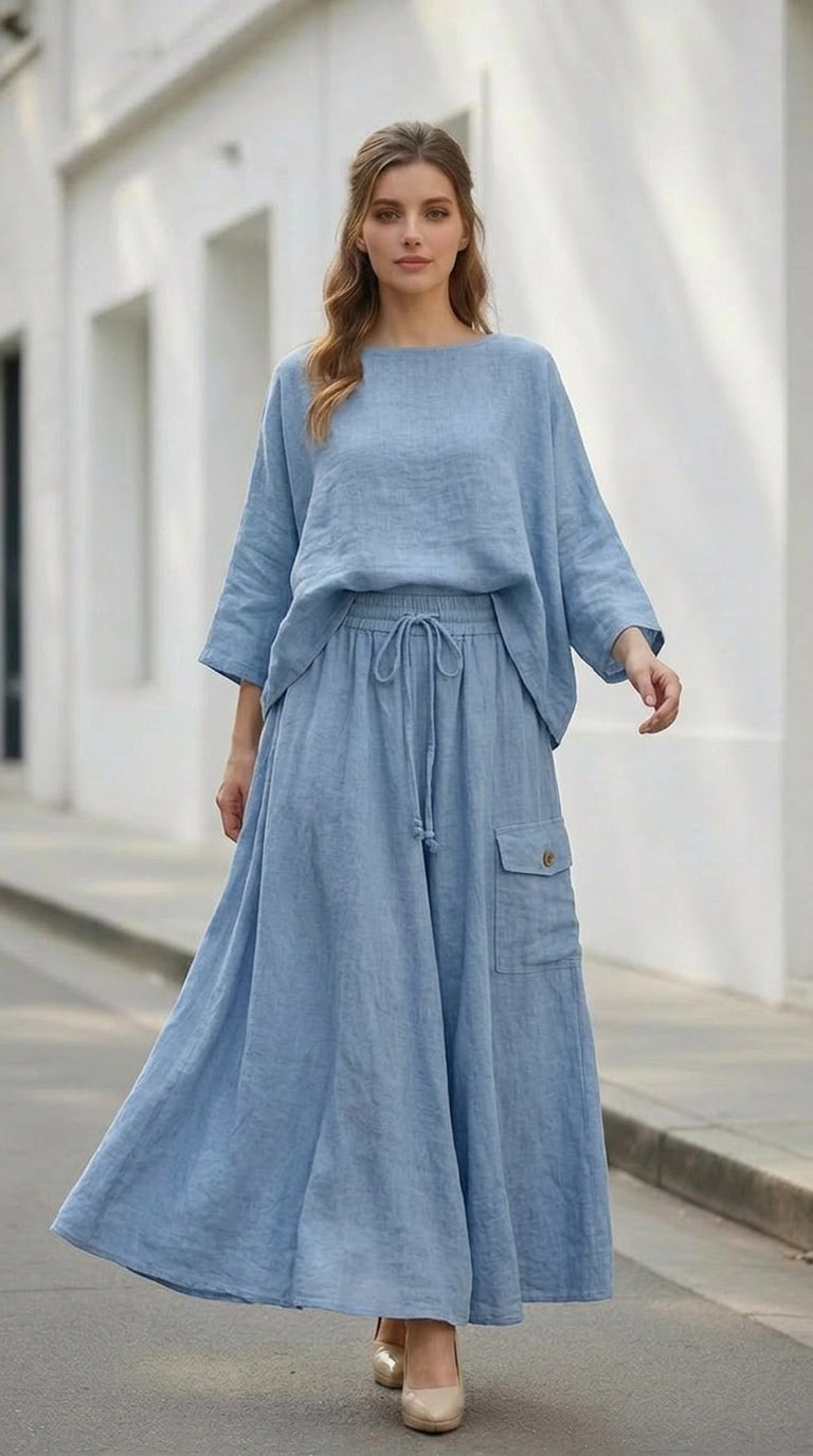 Loose-fitting solid color two-piece suit with long-sleeved pullover top and long skirt