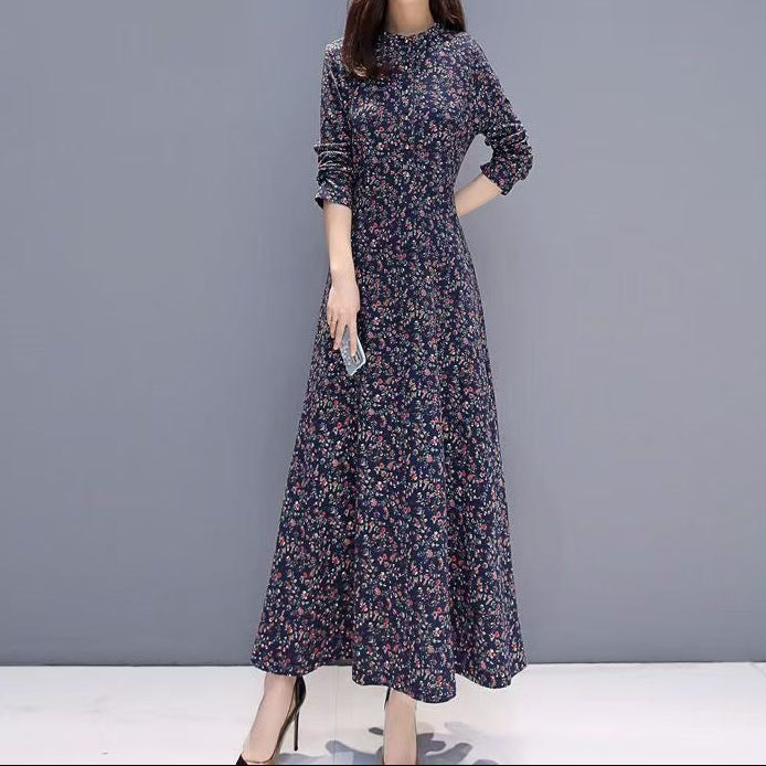 Back view showing graceful draping and refined tailoring of the dress