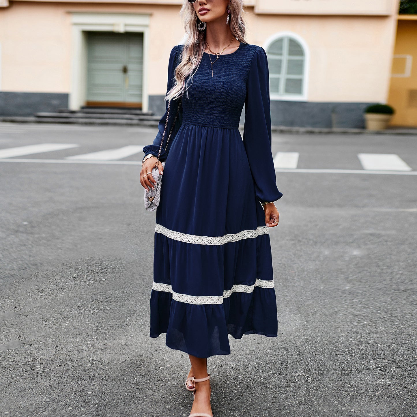 Full-length front view of black maxi dress on model